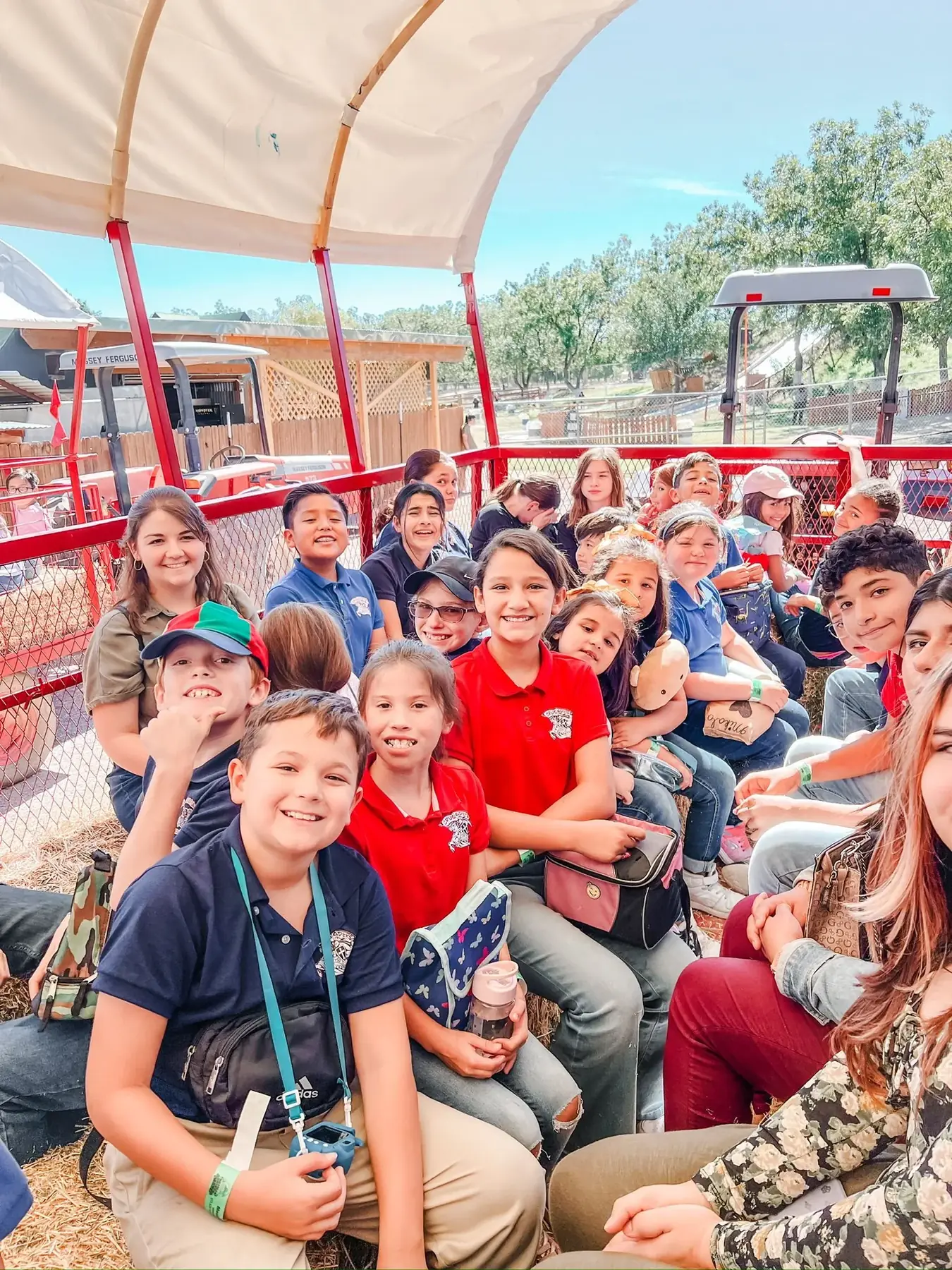 A NECA class and teacher riding together during an off-campus field trip.