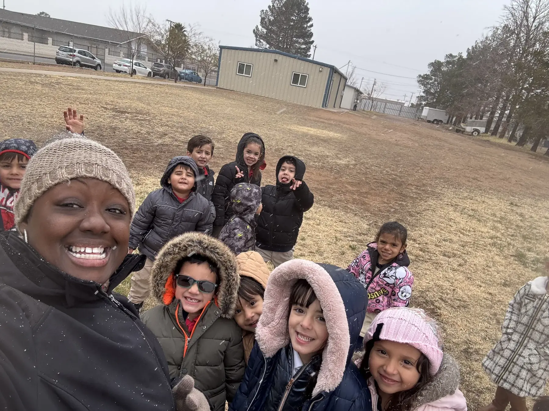 Enjoying a chilly school day in our coats!
